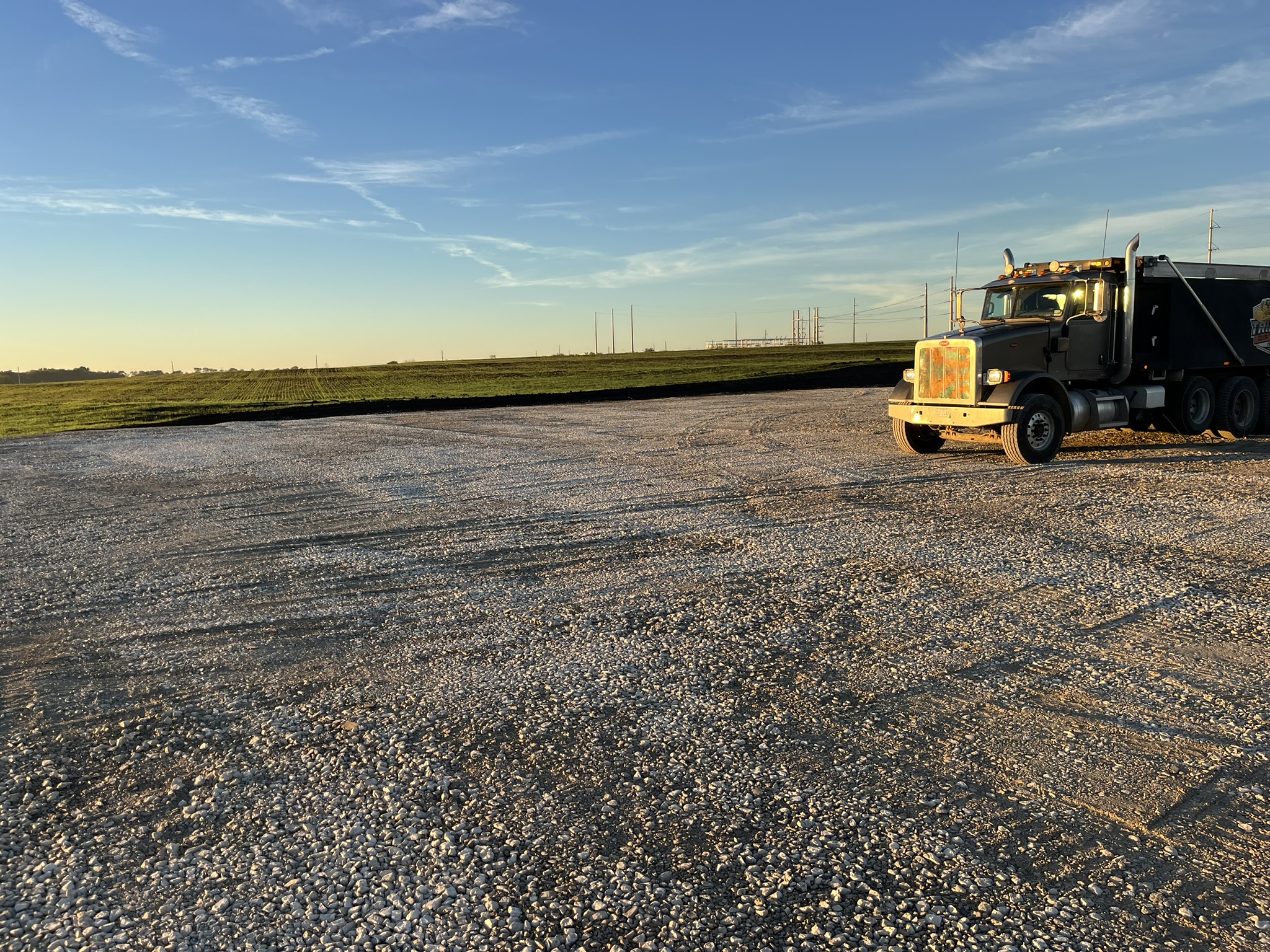 Gravel road or driveway surface prepared with proper grading and compaction