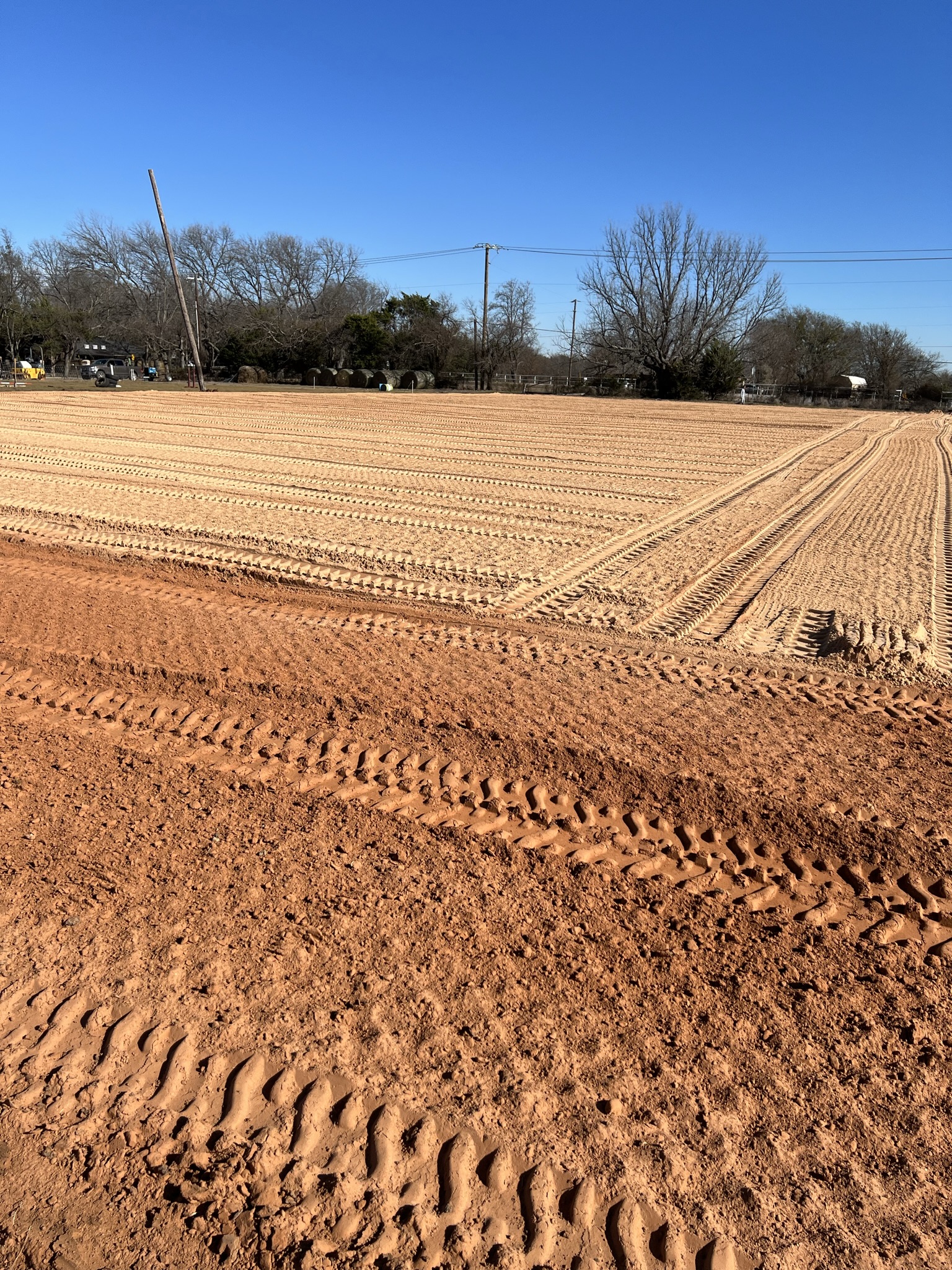 Prepared livestock arena and cow pen area on rural property