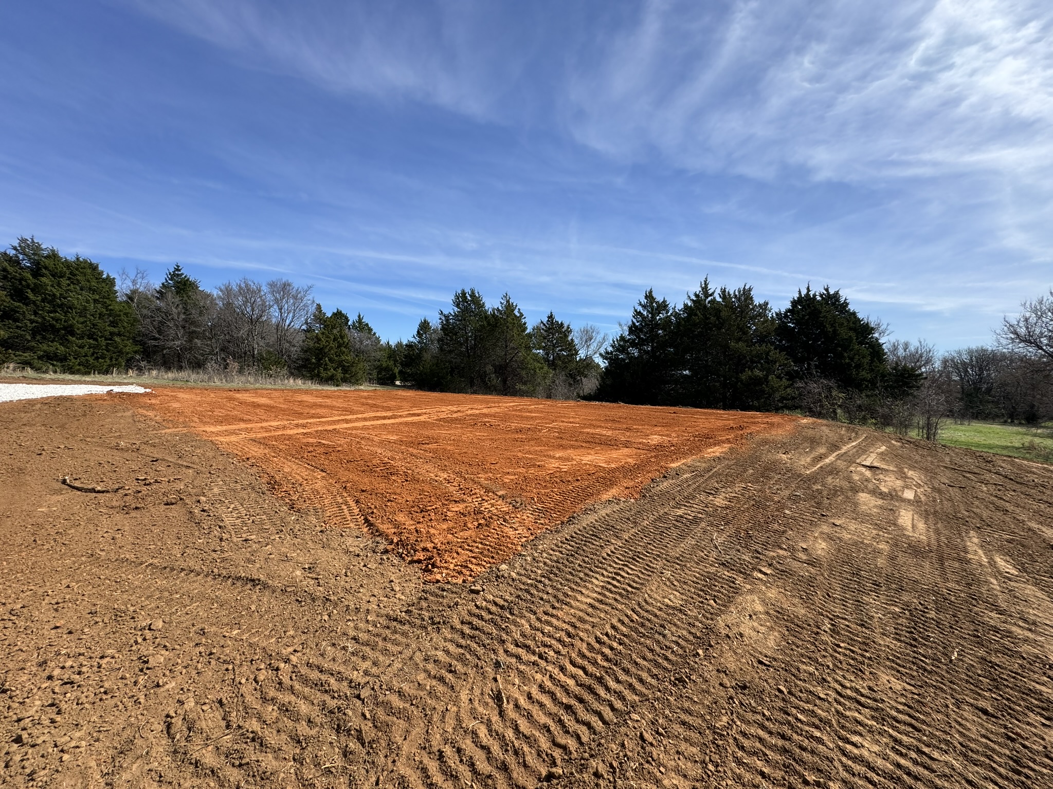 Residential home site with freshly prepared foundation pad